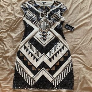 White with gold and black sequins dress Never worn